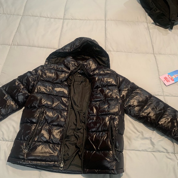 Guess Puffer Jacket for saleSelling due to not fitting me. More info-contact me